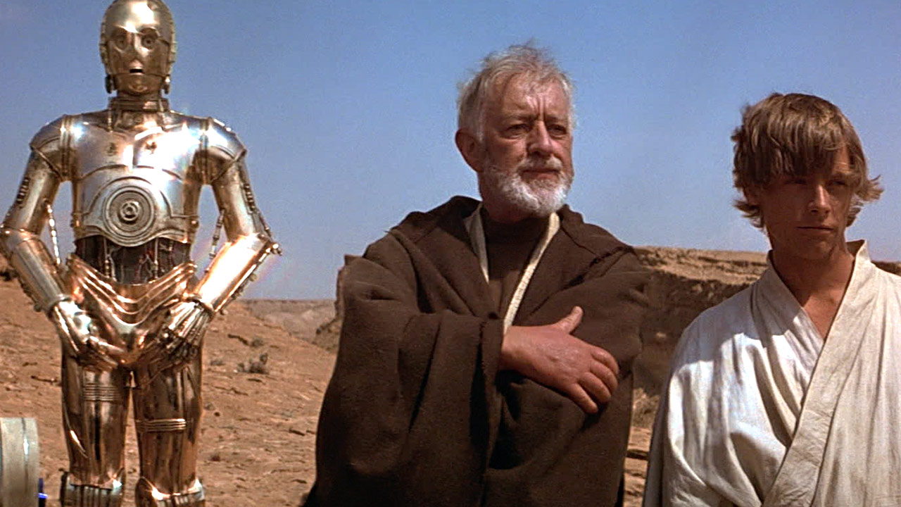 A scene from Star Wars with Obi-Wan and Luke outside of Mos Eisely